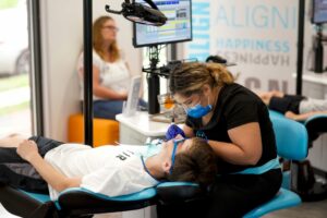 Team member at work on patient